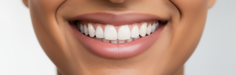 A_close_up_of_a_person_with_a_different_skin_tone__with_a_bright__healthy_smile__showing_perfect_whi